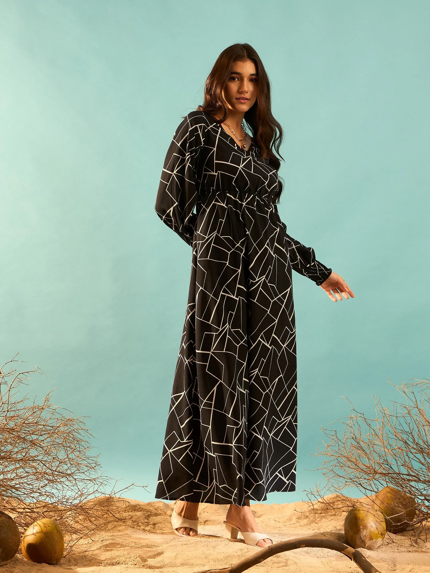 Berrylush Women Black & White Geometric Printed V-Neck Bishop Sleeves Flared A-Line Maxi Dress