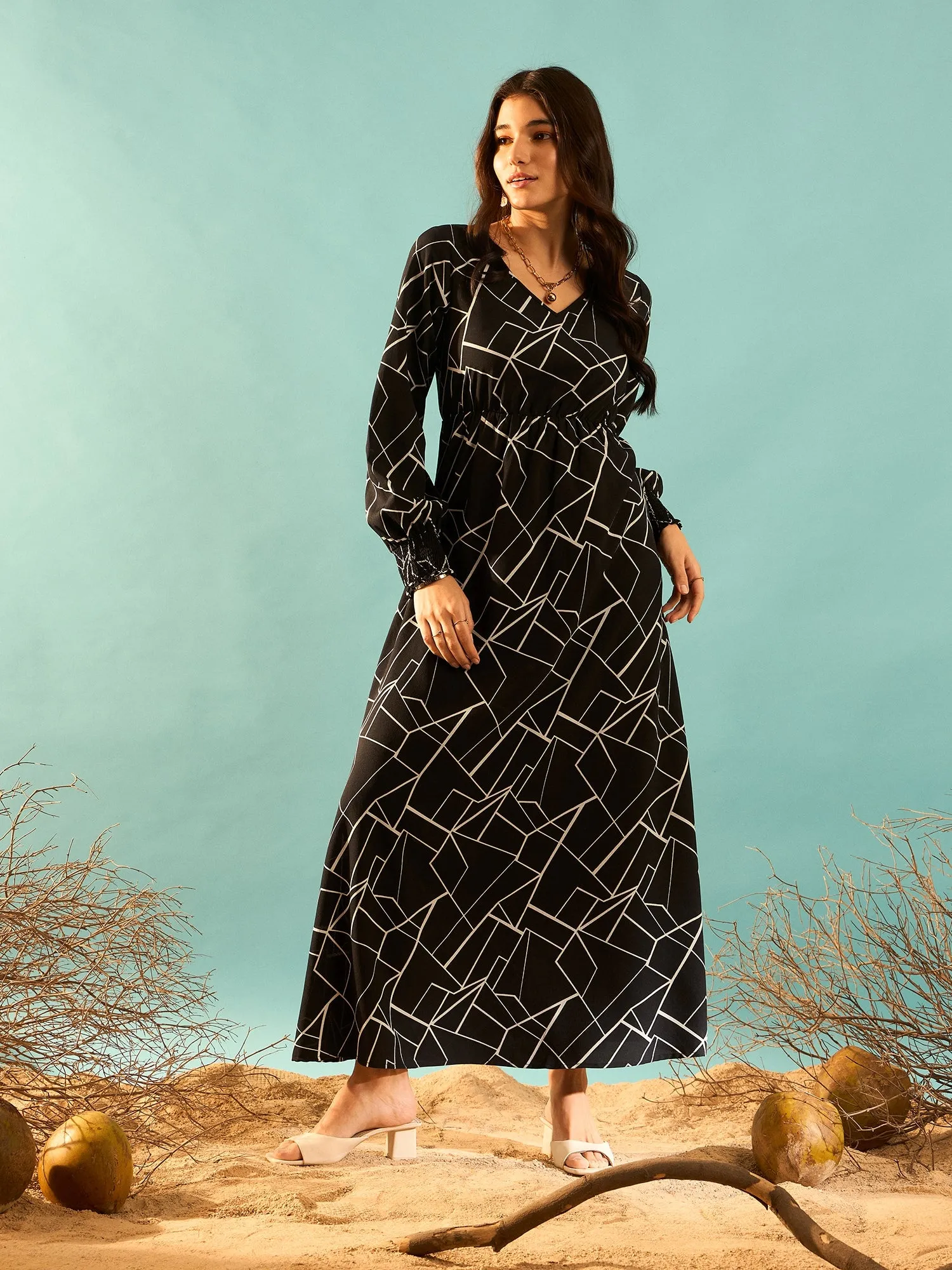 Berrylush Women Black & White Geometric Printed V-Neck Bishop Sleeves Flared A-Line Maxi Dress